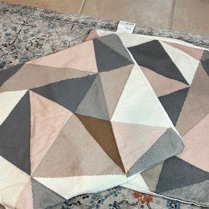 Set of two Blush Geometric throw pillows from Pier One